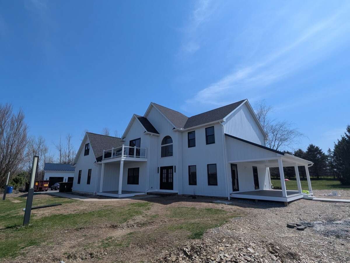 New Tripoli exterior house remodel before and after — Core Structures Inc. (photo 2)