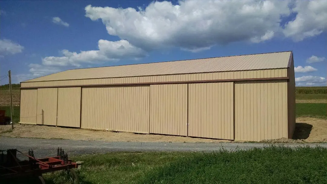 A large building with many windows and doors.