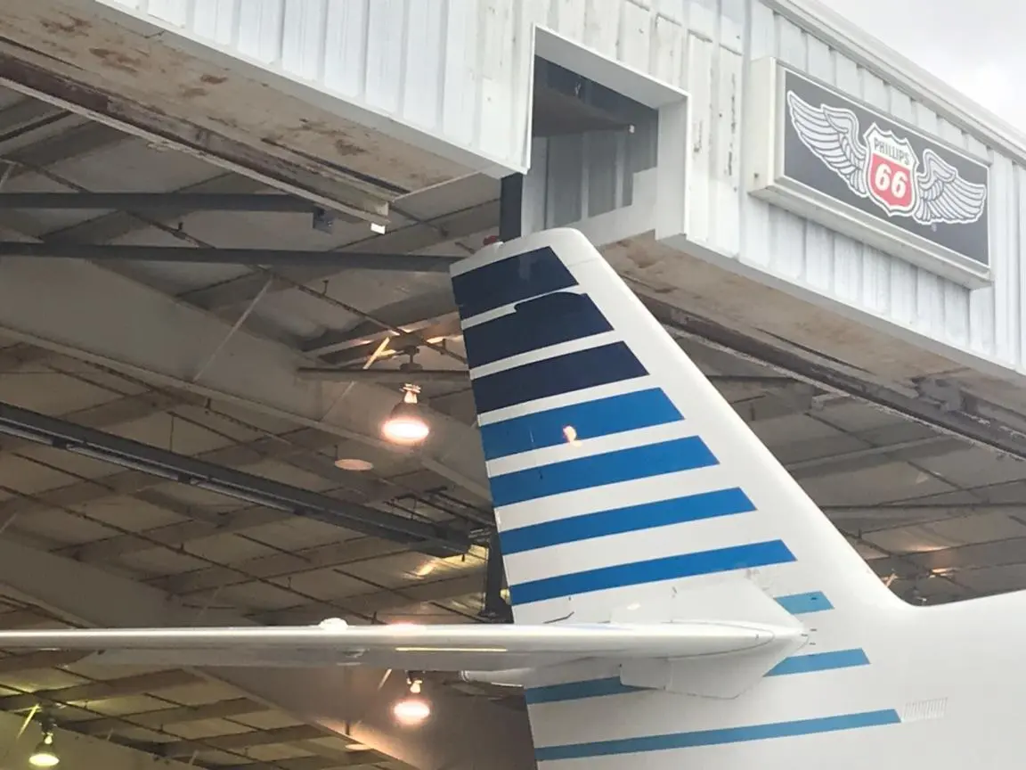 A close up of the tail end of an airplane.